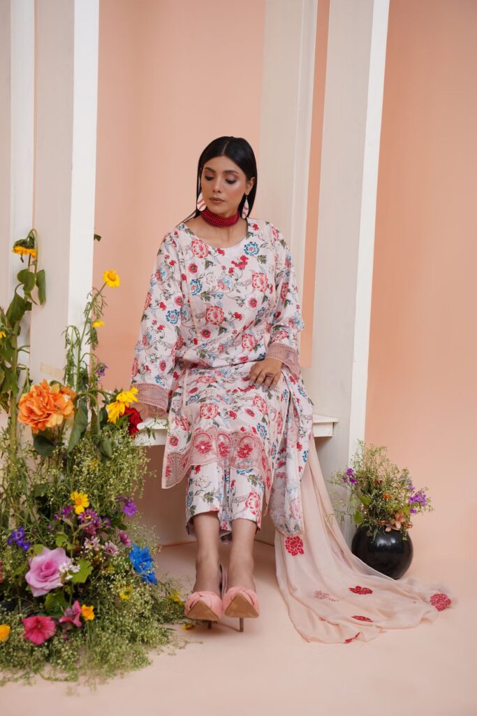 Woman in a floral three-piece